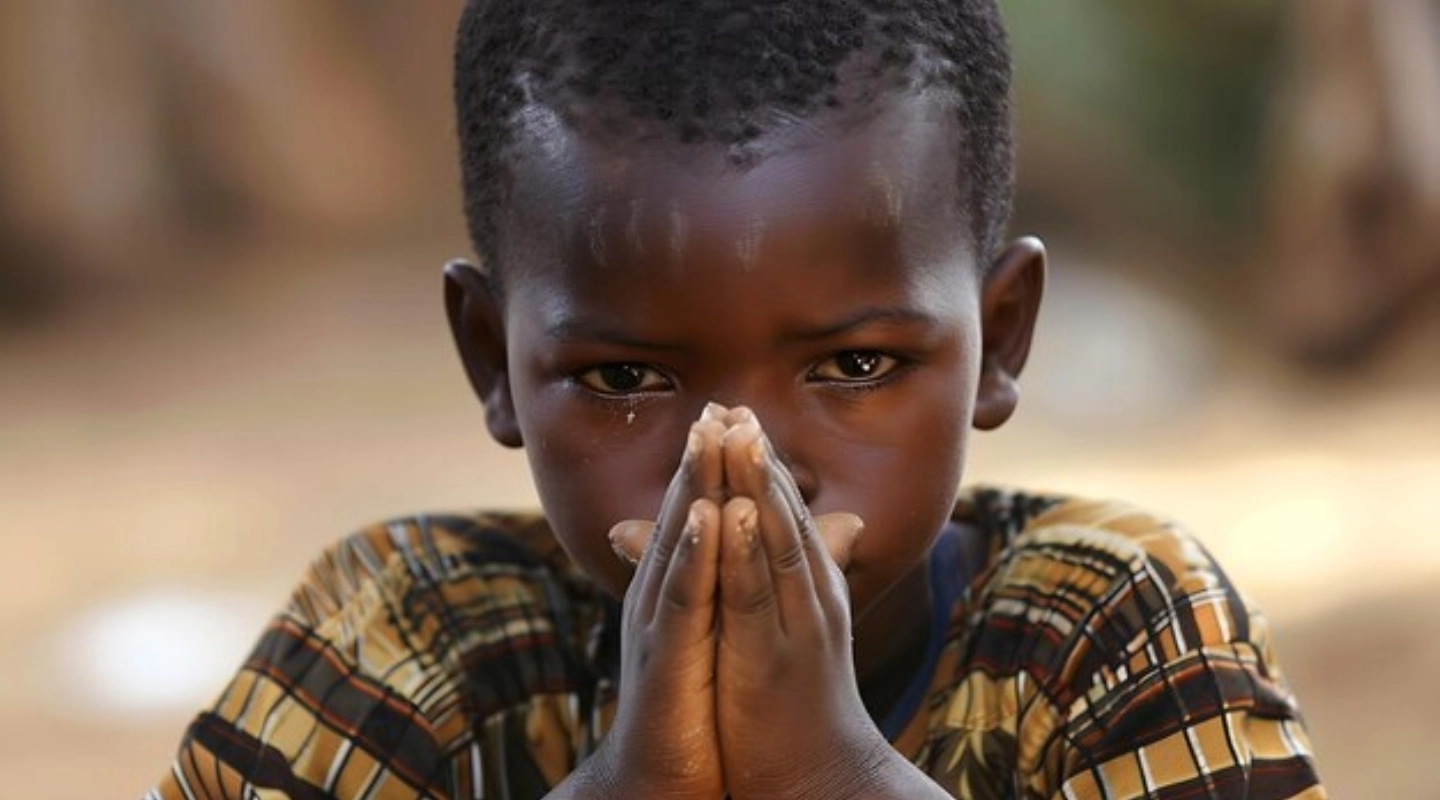 Hopeful child looking up